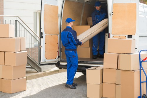 Moving van and boxes for removals in Roehampton