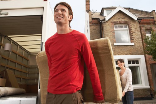 Commercial moving team handling office equipment in Roehampton