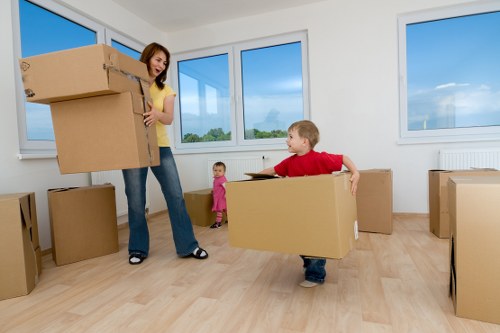 Same day removals team loading furniture in Roehampton