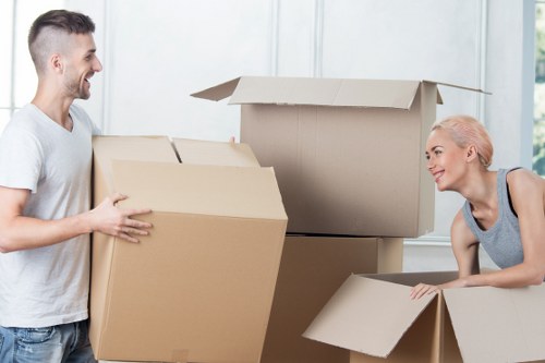 A removal team handling furniture during a local house move