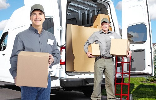 Packed boxes and furniture ready for a Roehampton house move