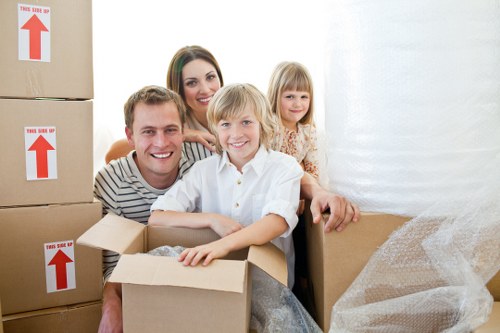 Commercial moving team handling office furniture