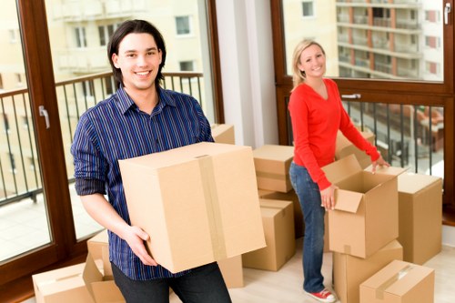 Business relocation team loading office items for transport